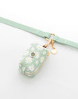 Pistachio Green Daisy Waste Bag Holder | Dog Poop Bag Holder | Dog Walk Bag | Shop Sunny Tails