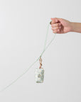Pistachio Green Daisy Waste Bag Holder | Dog Poop Bag Holder | Dog Walk Bag | Shop Sunny Tails